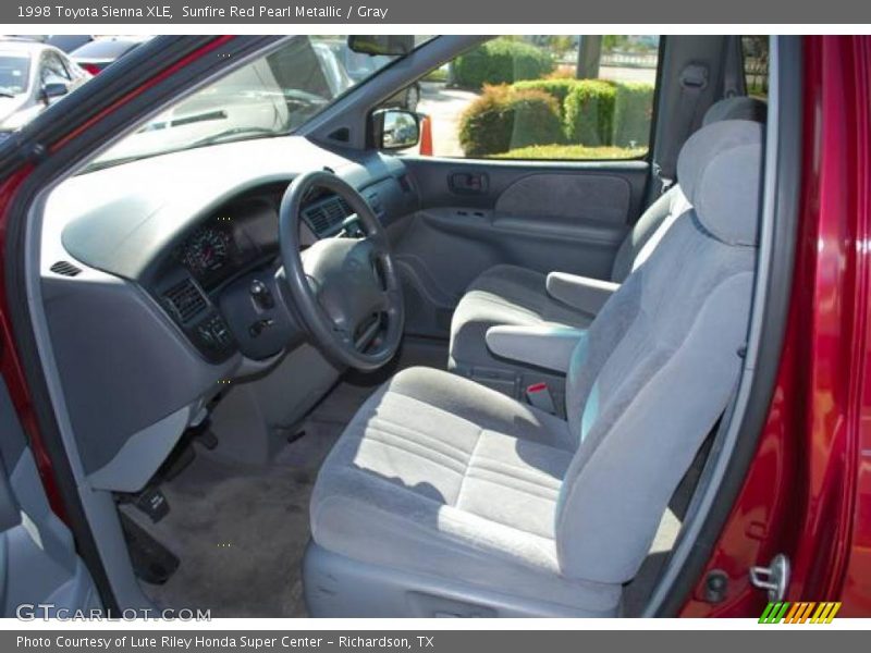 Sunfire Red Pearl Metallic / Gray 1998 Toyota Sienna XLE
