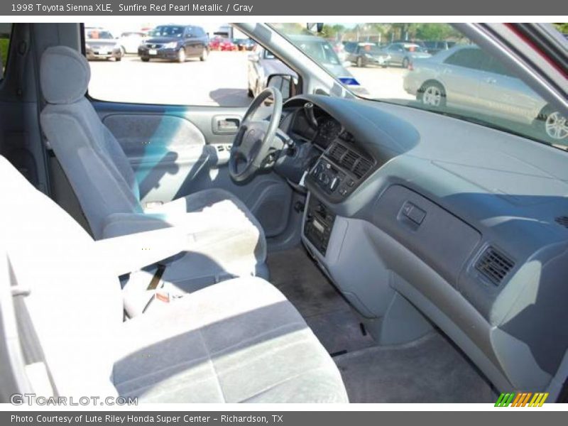 Sunfire Red Pearl Metallic / Gray 1998 Toyota Sienna XLE