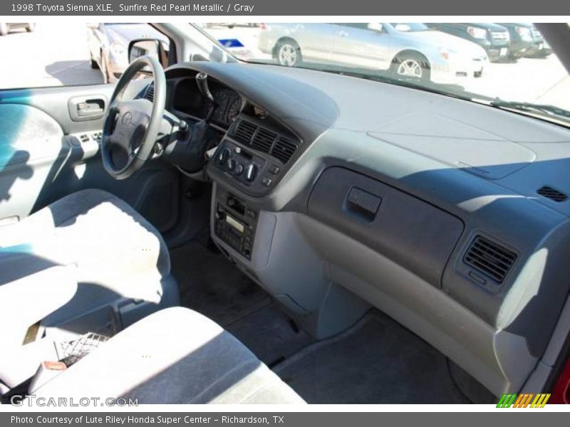Sunfire Red Pearl Metallic / Gray 1998 Toyota Sienna XLE
