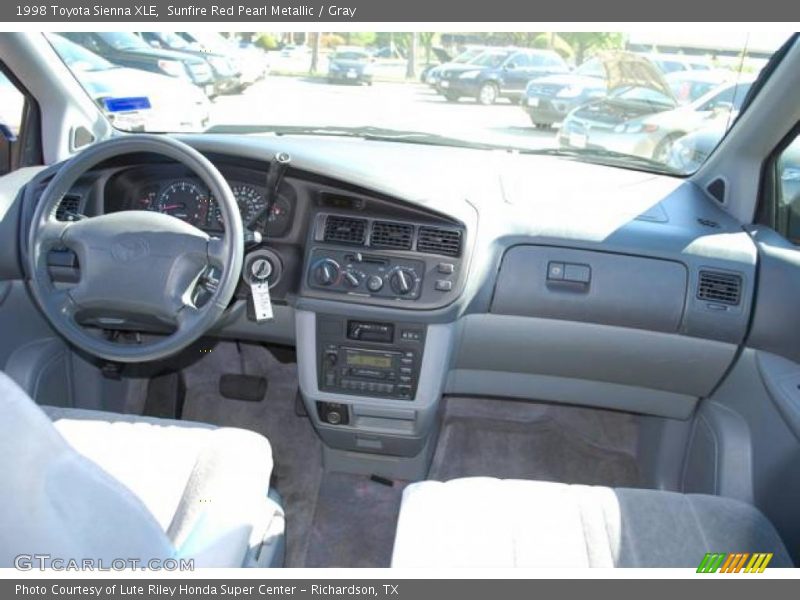 Sunfire Red Pearl Metallic / Gray 1998 Toyota Sienna XLE