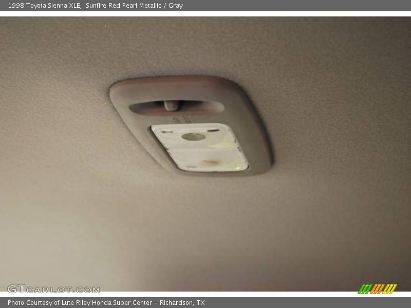 Sunfire Red Pearl Metallic / Gray 1998 Toyota Sienna XLE