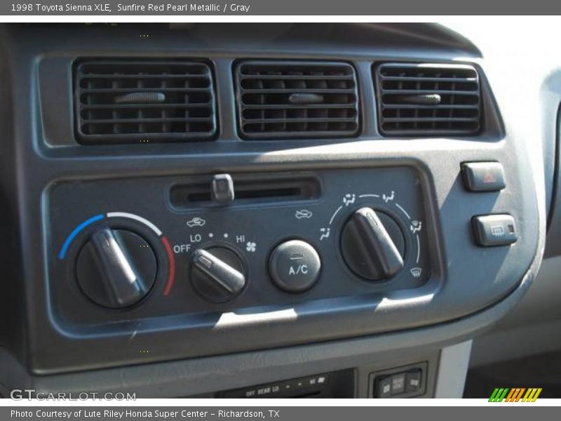 Sunfire Red Pearl Metallic / Gray 1998 Toyota Sienna XLE
