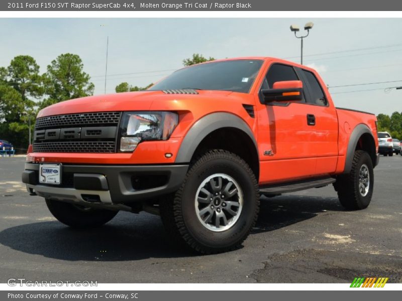 Front 3/4 View of 2011 F150 SVT Raptor SuperCab 4x4