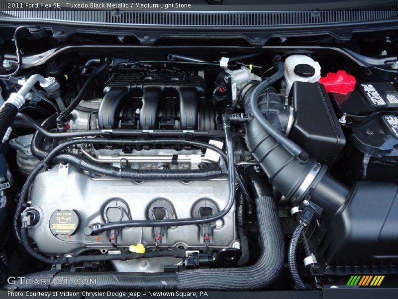 Tuxedo Black Metallic / Medium Light Stone 2011 Ford Flex SE