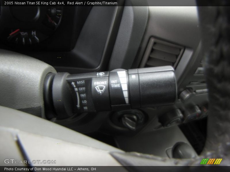 Red Alert / Graphite/Titanium 2005 Nissan Titan SE King Cab 4x4