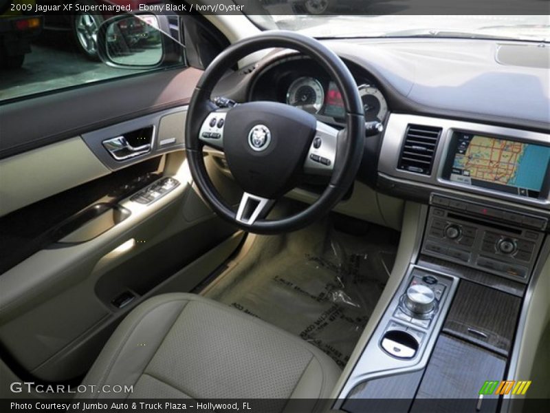 Ebony Black / Ivory/Oyster 2009 Jaguar XF Supercharged