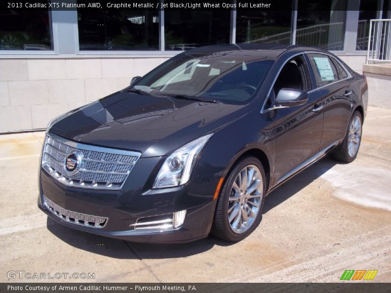Front 3/4 View of 2013 XTS Platinum AWD