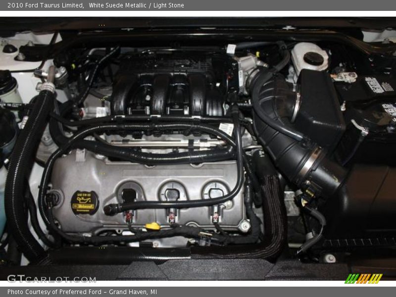White Suede Metallic / Light Stone 2010 Ford Taurus Limited