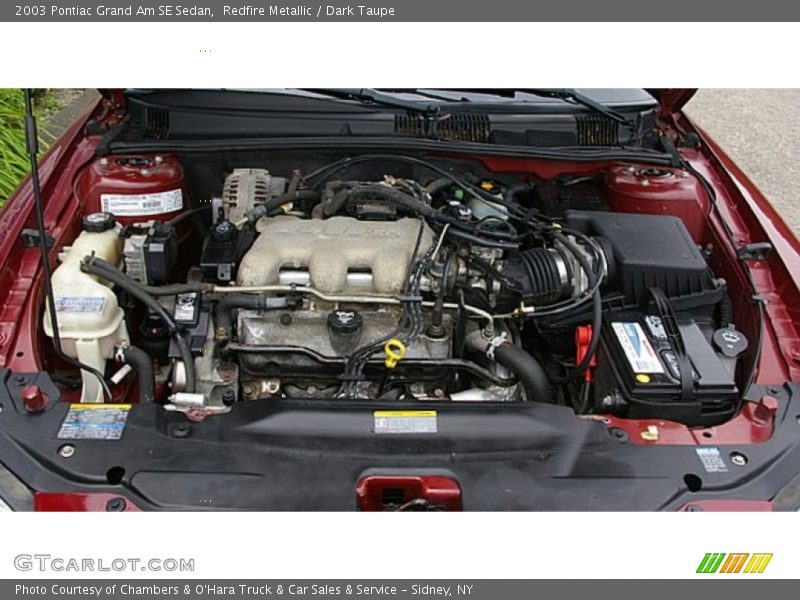 Redfire Metallic / Dark Taupe 2003 Pontiac Grand Am SE Sedan