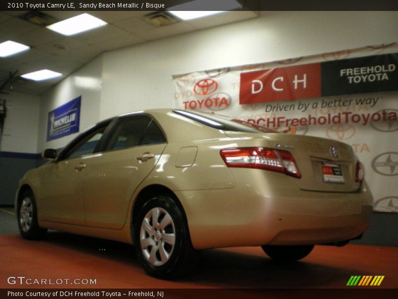 Sandy Beach Metallic / Bisque 2010 Toyota Camry LE