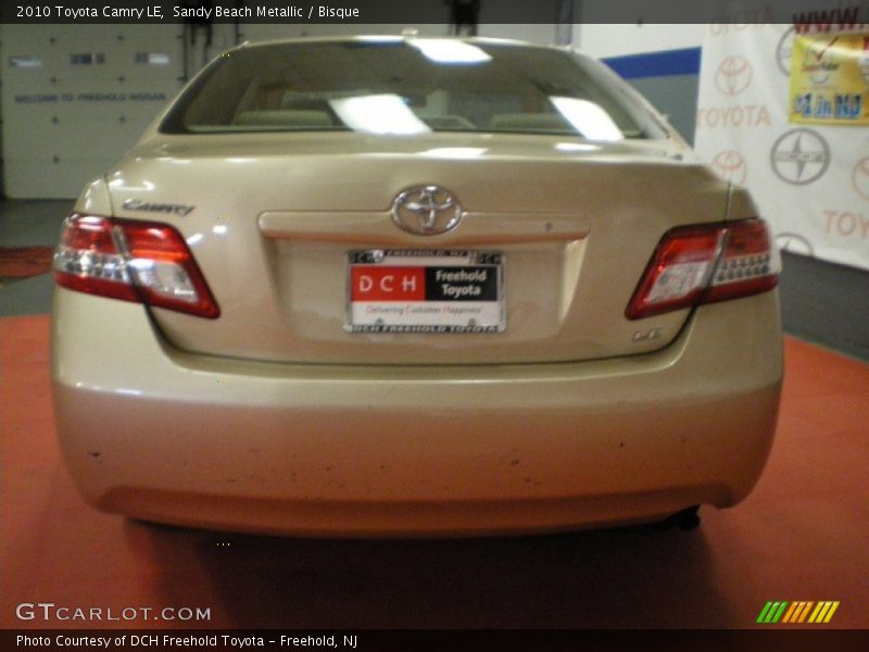 Sandy Beach Metallic / Bisque 2010 Toyota Camry LE