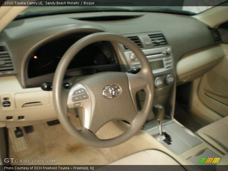 Sandy Beach Metallic / Bisque 2010 Toyota Camry LE
