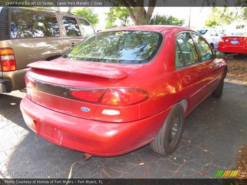 Laser Red Metallic / Gray 1997 Ford Escort LX Sedan
