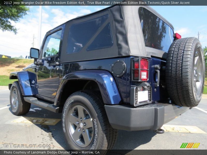 True Blue Pearl / Freedom Edition Black Tectonic/Quick Silver Accent 2012 Jeep Wrangler Oscar Mike Freedom Edition 4x4