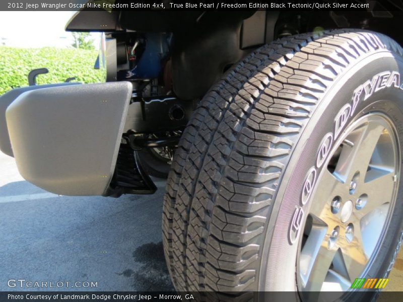 True Blue Pearl / Freedom Edition Black Tectonic/Quick Silver Accent 2012 Jeep Wrangler Oscar Mike Freedom Edition 4x4