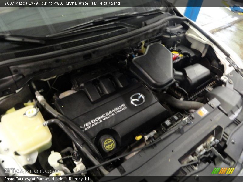 Crystal White Pearl Mica / Sand 2007 Mazda CX-9 Touring AWD