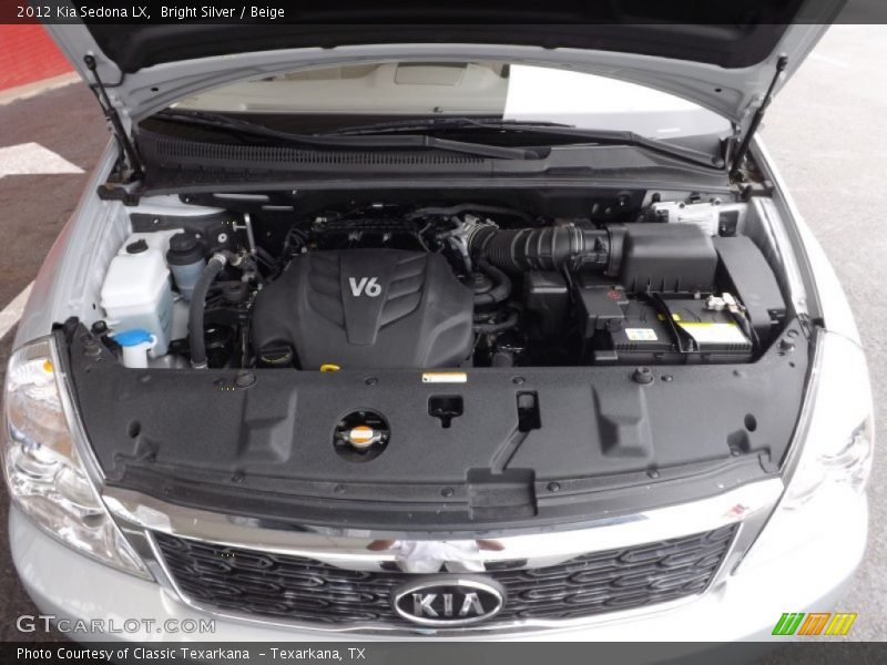 Bright Silver / Beige 2012 Kia Sedona LX