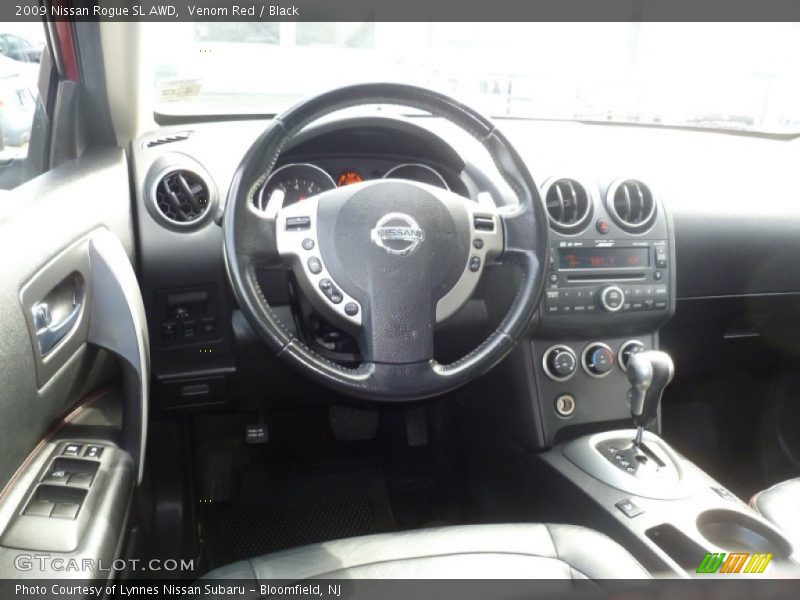 Venom Red / Black 2009 Nissan Rogue SL AWD
