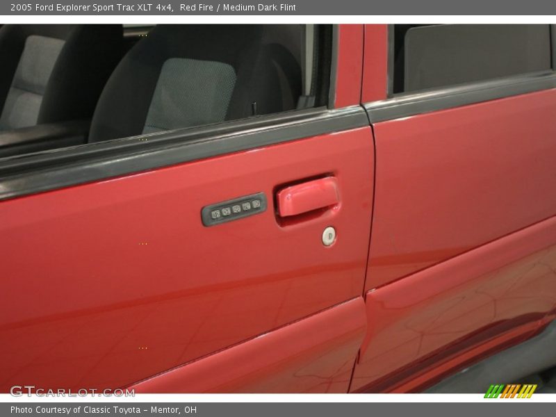 Red Fire / Medium Dark Flint 2005 Ford Explorer Sport Trac XLT 4x4