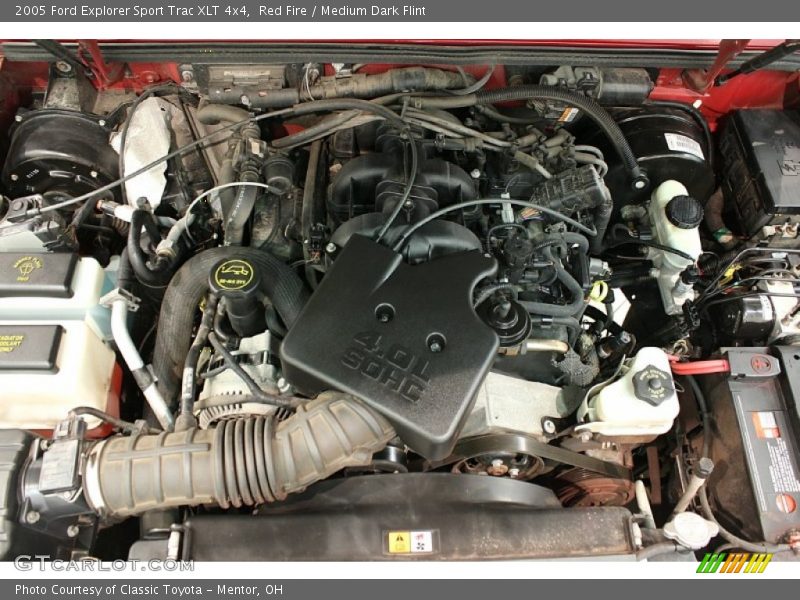 Red Fire / Medium Dark Flint 2005 Ford Explorer Sport Trac XLT 4x4