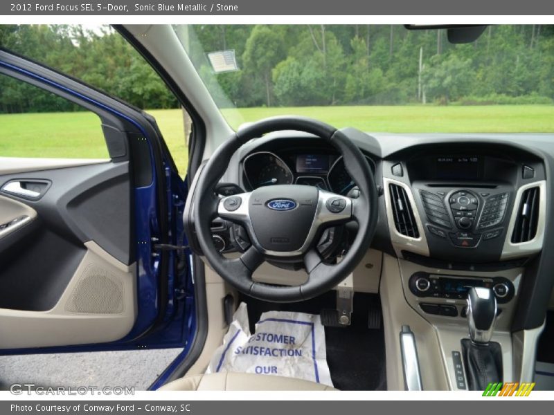 Sonic Blue Metallic / Stone 2012 Ford Focus SEL 5-Door