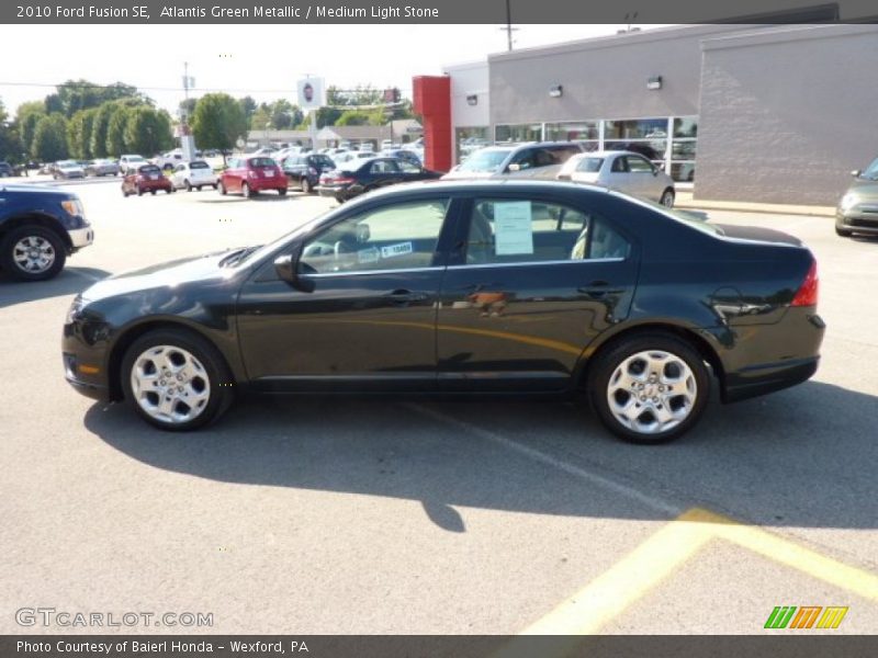 Atlantis Green Metallic / Medium Light Stone 2010 Ford Fusion SE