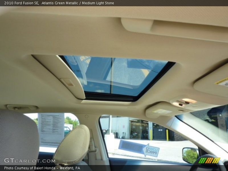 Atlantis Green Metallic / Medium Light Stone 2010 Ford Fusion SE