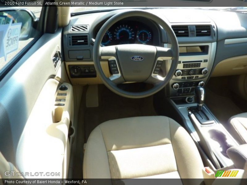 Atlantis Green Metallic / Medium Light Stone 2010 Ford Fusion SE