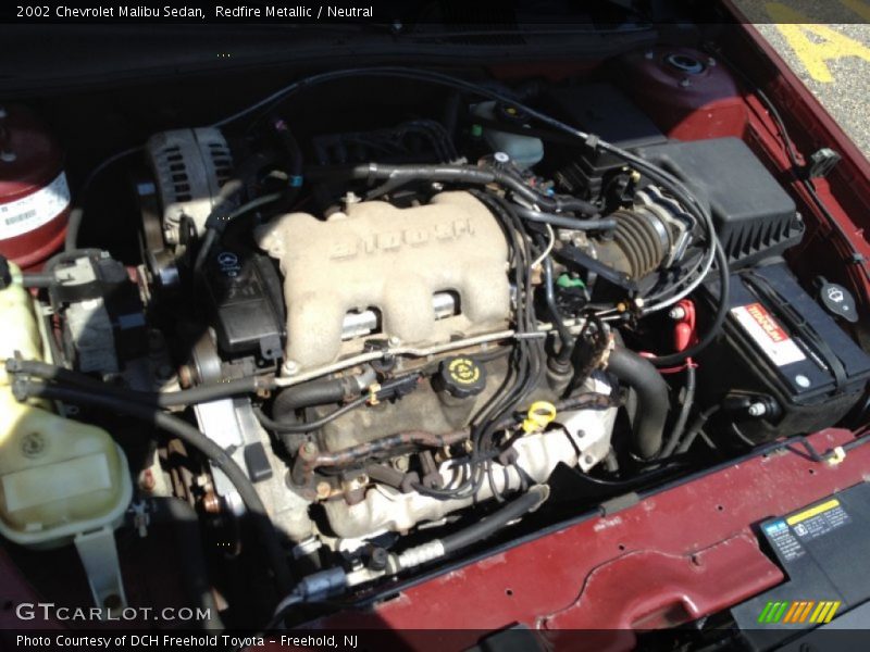 Redfire Metallic / Neutral 2002 Chevrolet Malibu Sedan