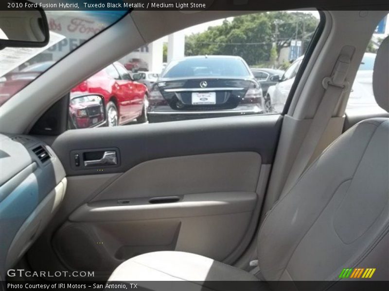 Tuxedo Black Metallic / Medium Light Stone 2010 Ford Fusion Hybrid