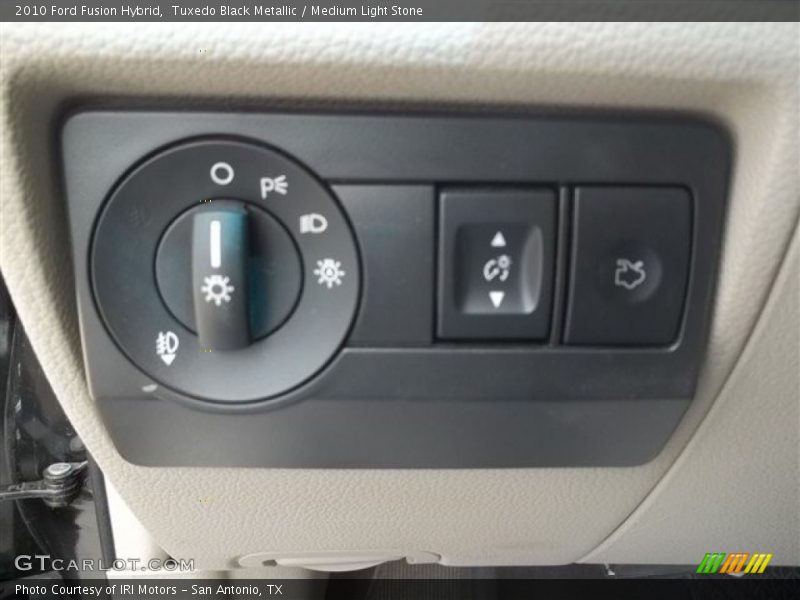 Tuxedo Black Metallic / Medium Light Stone 2010 Ford Fusion Hybrid