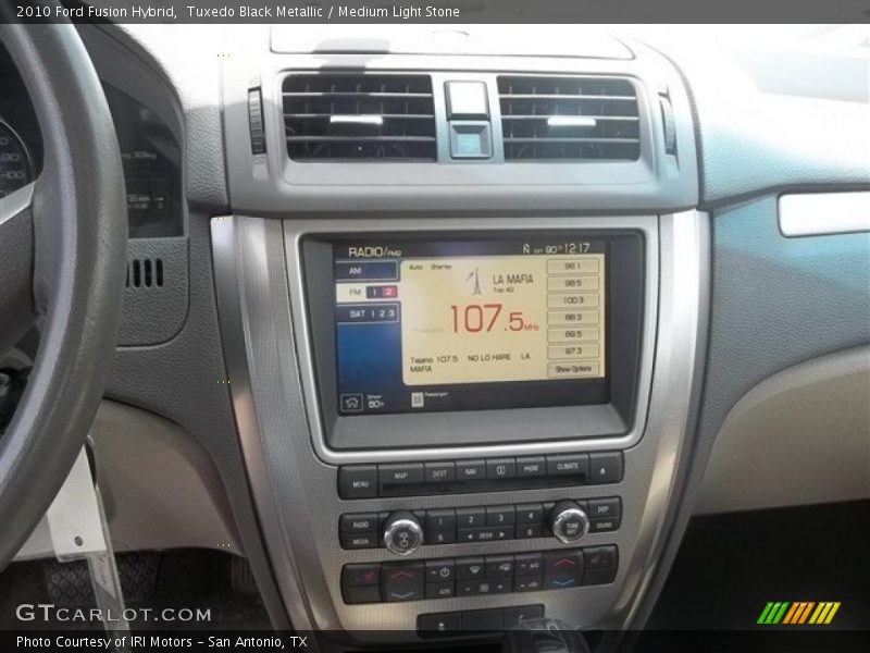 Tuxedo Black Metallic / Medium Light Stone 2010 Ford Fusion Hybrid