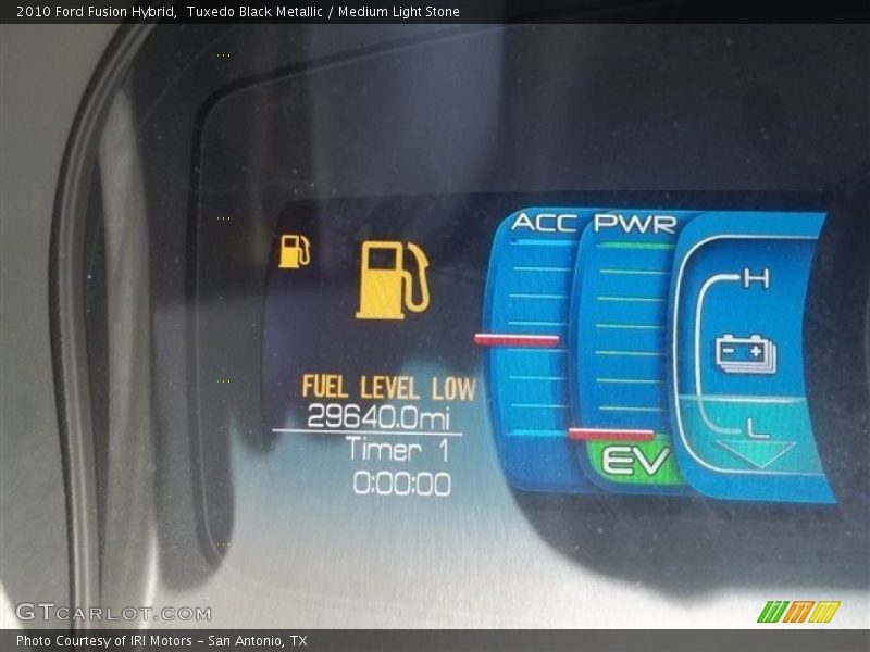 Tuxedo Black Metallic / Medium Light Stone 2010 Ford Fusion Hybrid