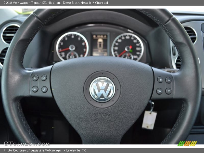 Deep Black Metallic / Charcoal 2010 Volkswagen Tiguan SEL 4Motion