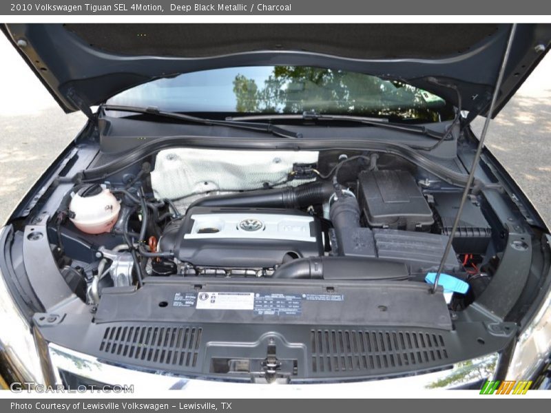 Deep Black Metallic / Charcoal 2010 Volkswagen Tiguan SEL 4Motion