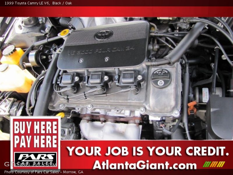 Black / Oak 1999 Toyota Camry LE V6
