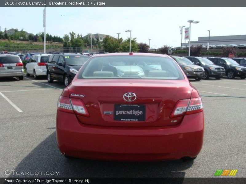 Barcelona Red Metallic / Bisque 2010 Toyota Camry LE