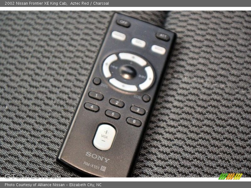 Aztec Red / Charcoal 2002 Nissan Frontier XE King Cab