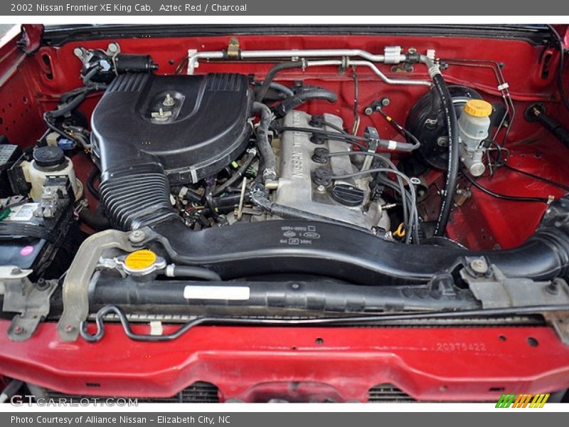 Aztec Red / Charcoal 2002 Nissan Frontier XE King Cab
