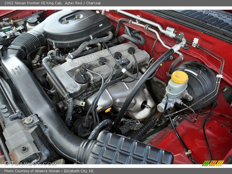 Aztec Red / Charcoal 2002 Nissan Frontier XE King Cab
