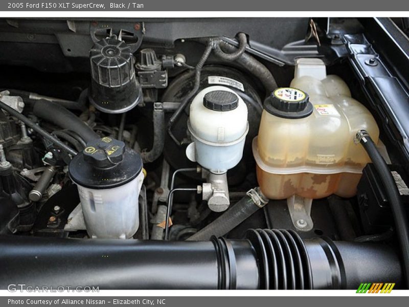 Black / Tan 2005 Ford F150 XLT SuperCrew