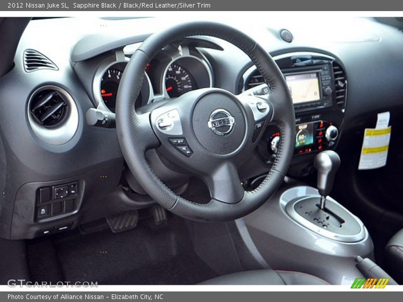 Sapphire Black / Black/Red Leather/Silver Trim 2012 Nissan Juke SL