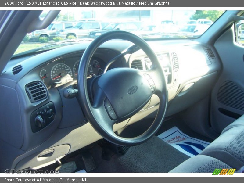 Deep Wedgewood Blue Metallic / Medium Graphite 2000 Ford F150 XLT Extended Cab 4x4