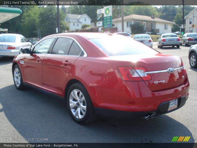 Red Candy / Charcoal Black 2011 Ford Taurus SEL
