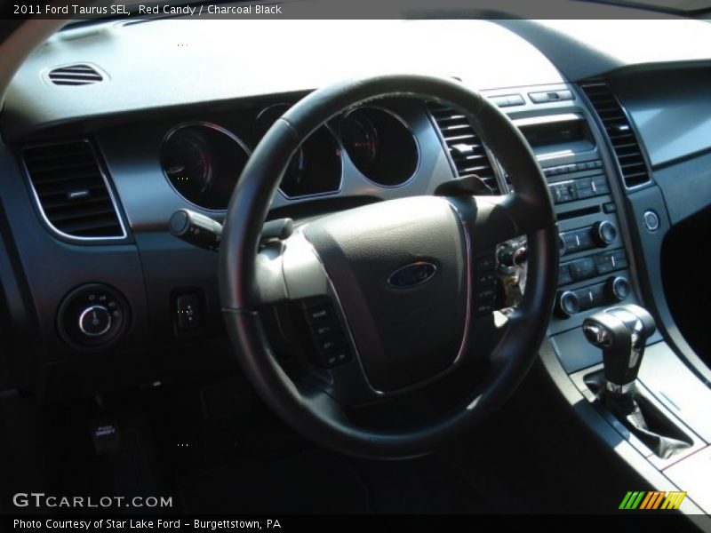 Red Candy / Charcoal Black 2011 Ford Taurus SEL