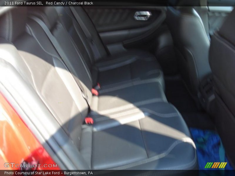 Red Candy / Charcoal Black 2011 Ford Taurus SEL