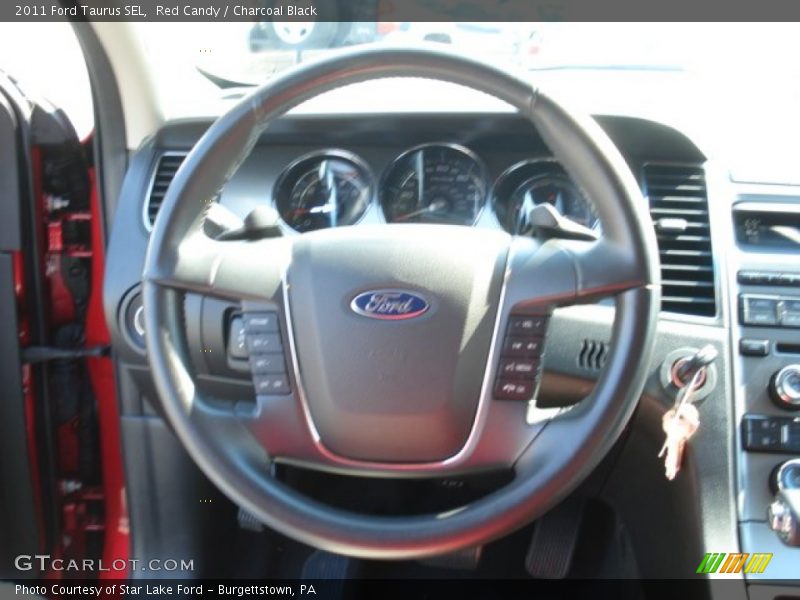 Red Candy / Charcoal Black 2011 Ford Taurus SEL