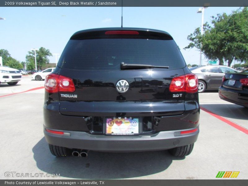 Deep Black Metallic / Sandstone 2009 Volkswagen Tiguan SE