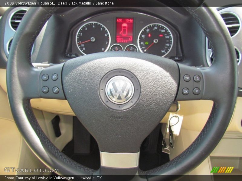 Deep Black Metallic / Sandstone 2009 Volkswagen Tiguan SE