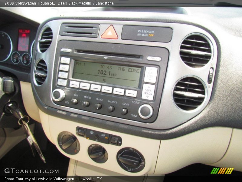 Deep Black Metallic / Sandstone 2009 Volkswagen Tiguan SE